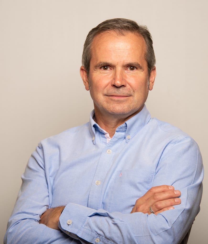 Mark Davies, Speaker Coach and Presentation Trainer, in a blue shirt